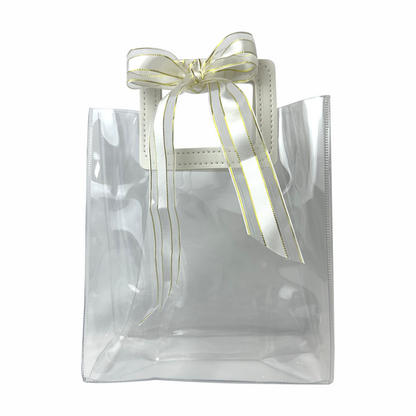 17x 19.5x9  Bolsa Transparente de PVC con agarradera y listón Blanca